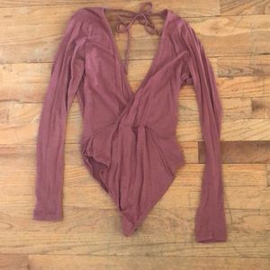 Rougue pinkish long sleeve deep V body suit